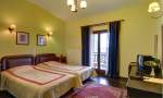 Τετράκλινο δωμάτιο, Ξενοδοχείο Ναιάδες: Λίμνη Πλαστήρα ξενοδοχεία δωμάτια τζάκι Νεοχώρι Καρδίτσα